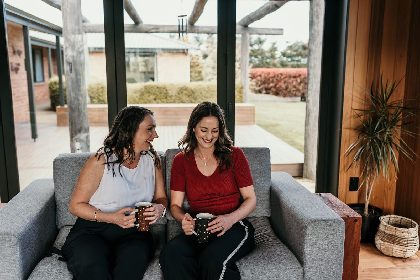 Charlie and Ash together, mid-laugh